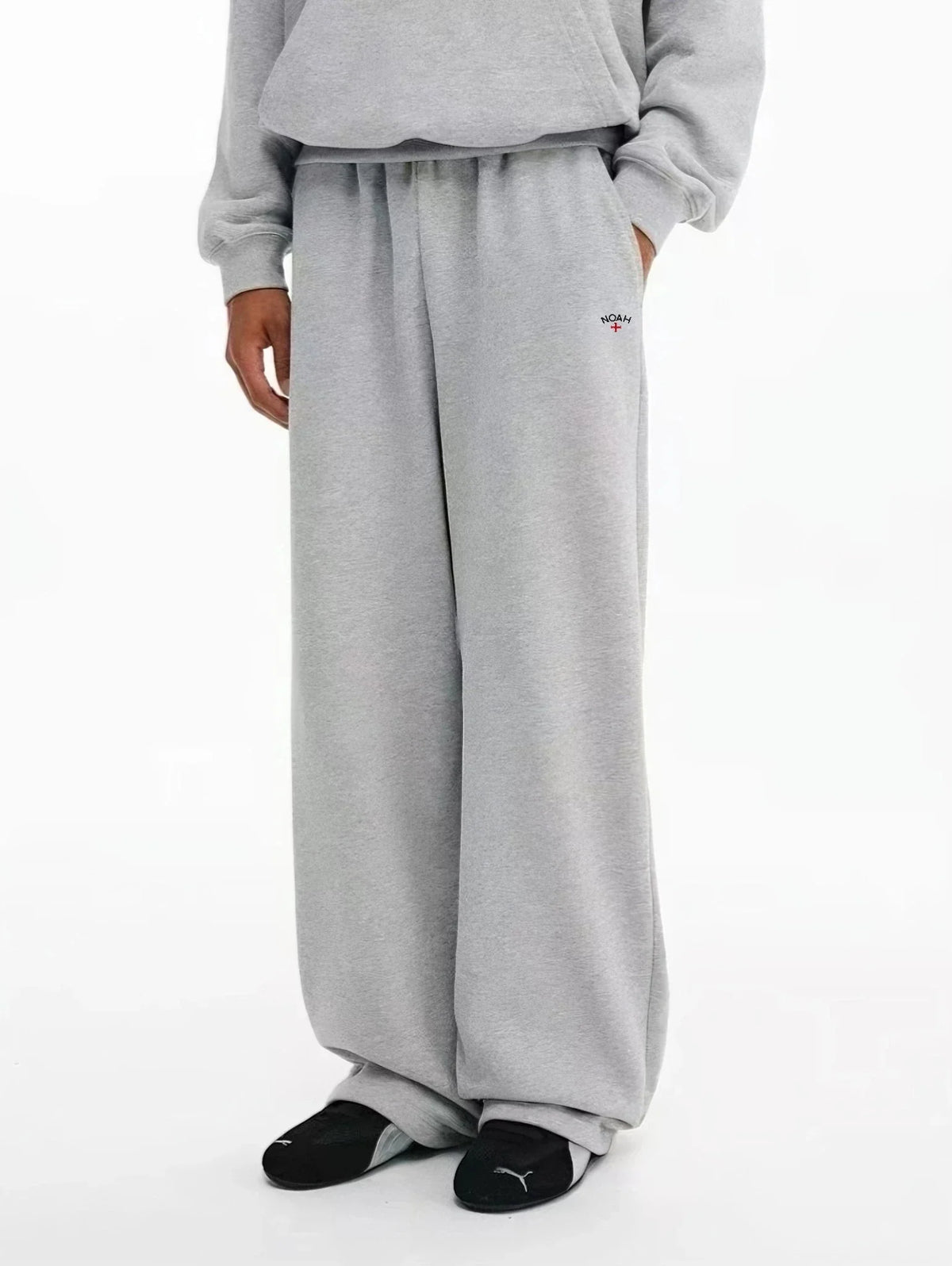 NOAH MARS Cross Logo Embroidered Micro Flared Sweatpants Men Casual Sports Pants