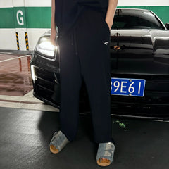NOAH MARS Paper Touch Windproof Curved Pants Cross Embroidery